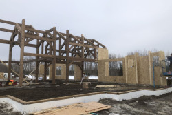 Photo: Large timber frame home under construction in 9,000 Sqft Home with Gymnasium