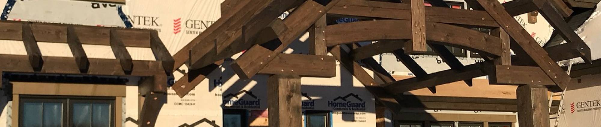 Outside of traditional timber frame home under construction